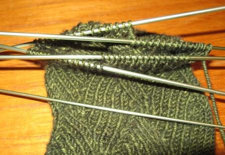 set of 5 green sock needles