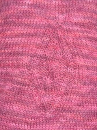 cable detail on Mary's sweater